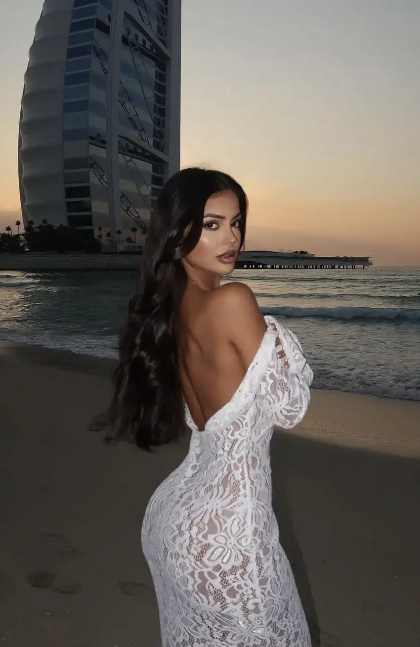 Jasmine Moroccan escort profile in a warm amber riad