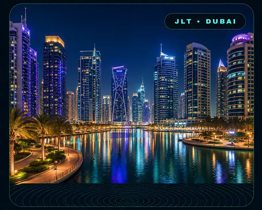 JLT Escorts Dubai lake skyline with illuminated towers, palm-lined promenade and water reflections
