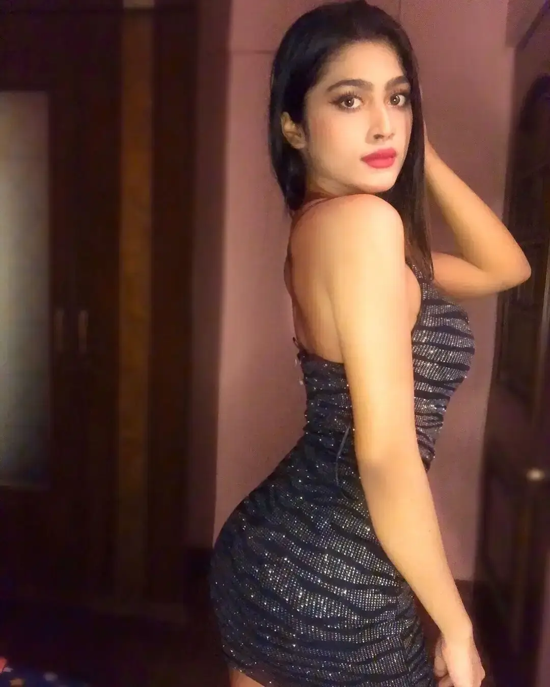 Sanam Indian escort profile on a Dubai Hills infinity deck